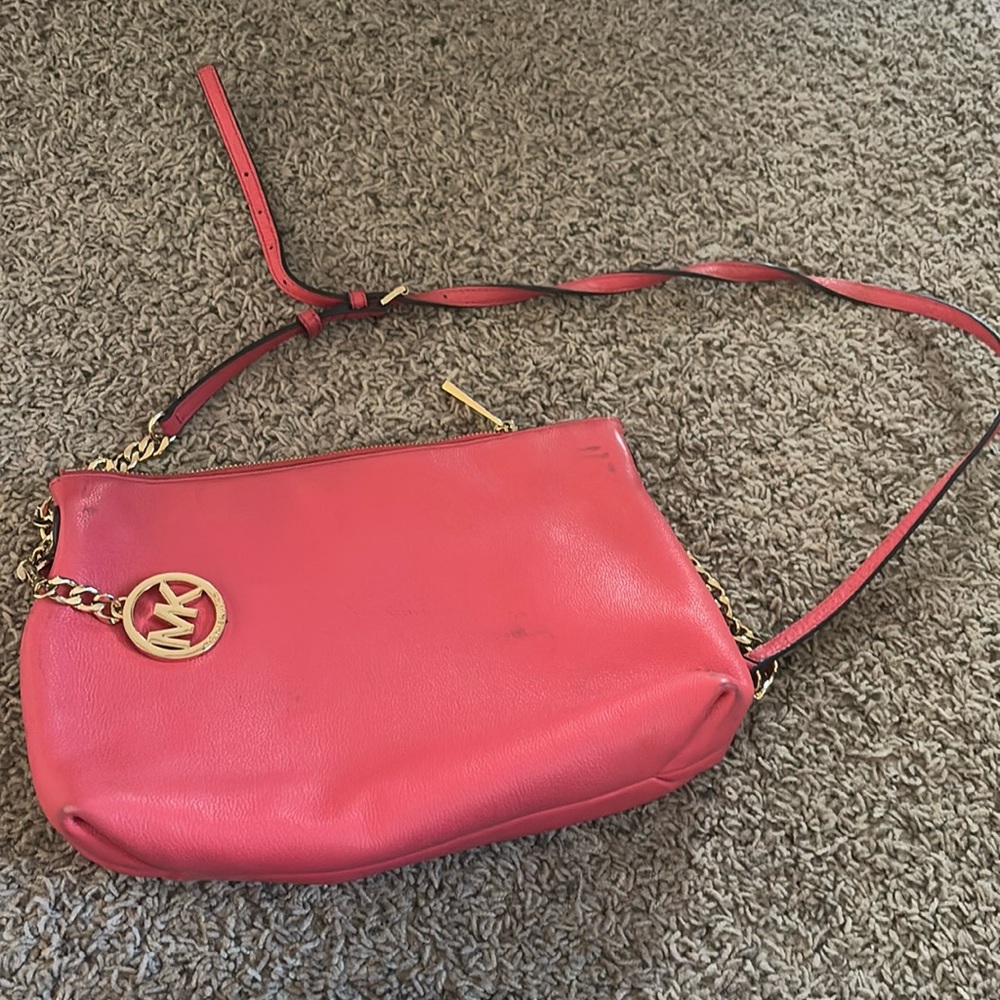 Super cute cross body pink Micheal kora bag, make an offer